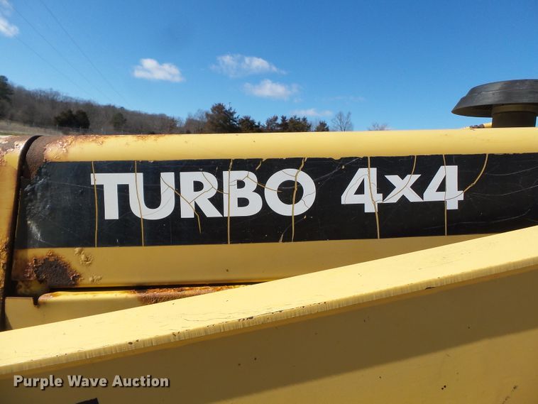 image for item DH7854 2000 John Deere 310SE backhoe