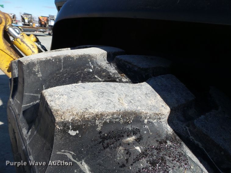 image for item DH7854 2000 John Deere 310SE backhoe