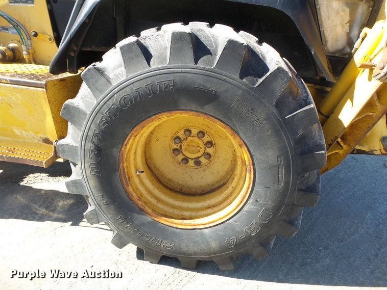 image for item DH7854 2000 John Deere 310SE backhoe