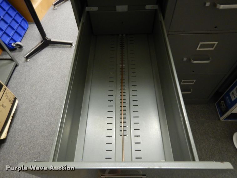 image for item ER9891 Approximately 6 filing cabinets