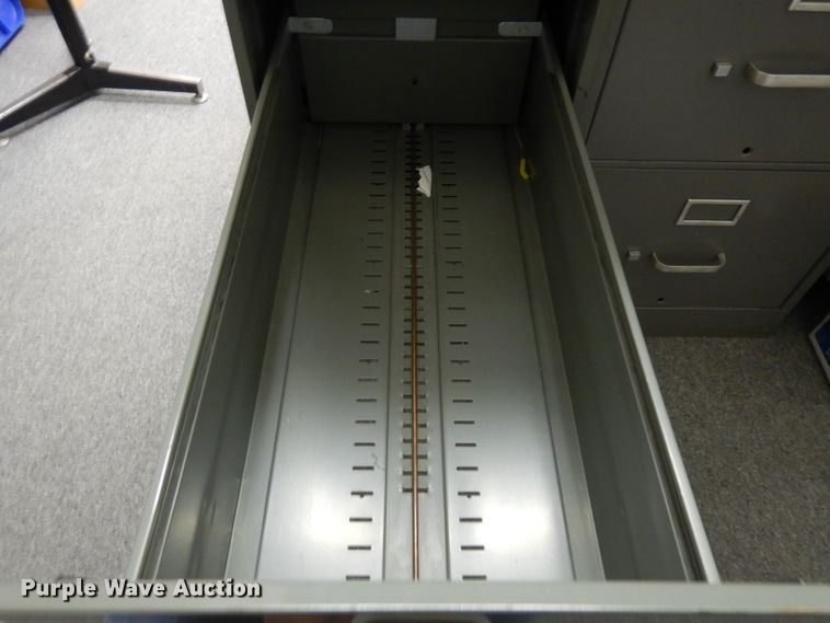 image for item ER9891 Approximately 6 filing cabinets