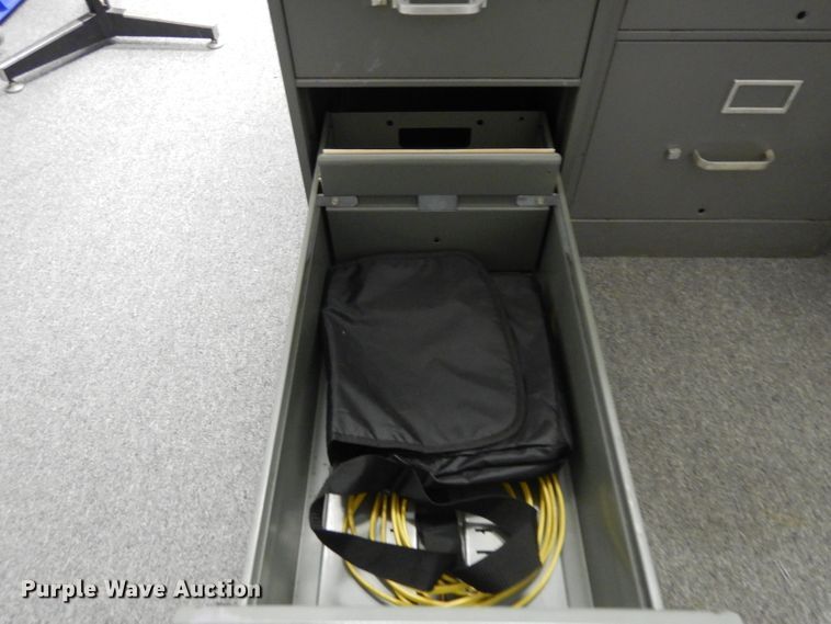 image for item ER9891 Approximately 6 filing cabinets