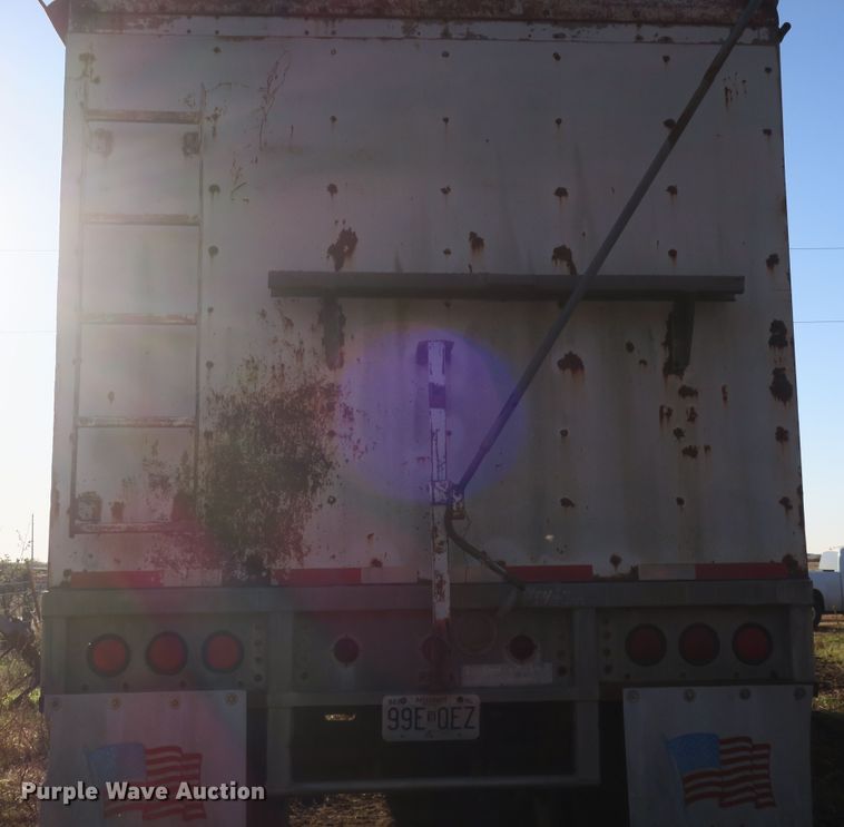 image for item DB10137 1981 Corn Husker 800 double hopper bottom grain trailer