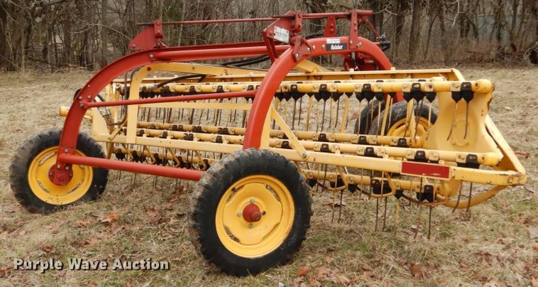 image for item GB9779 2006 New Holland Rolabar 258 hay rake