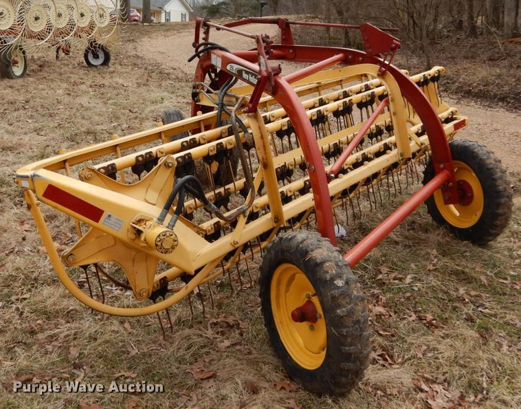 image for item GB9779 2006 New Holland Rolabar 258 hay rake