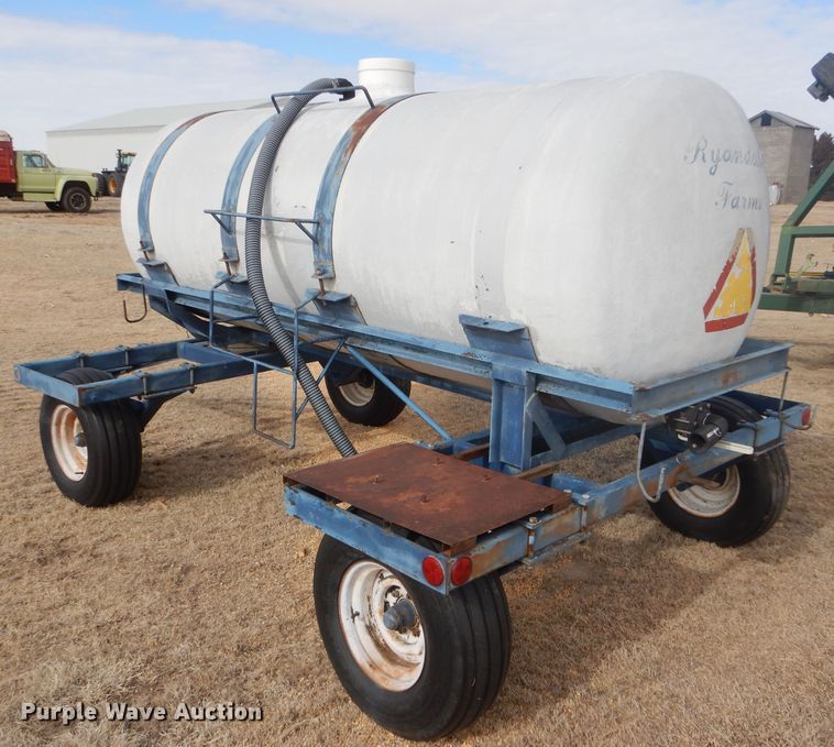 image for item GX9735 Red Ewald fertilizer trailer