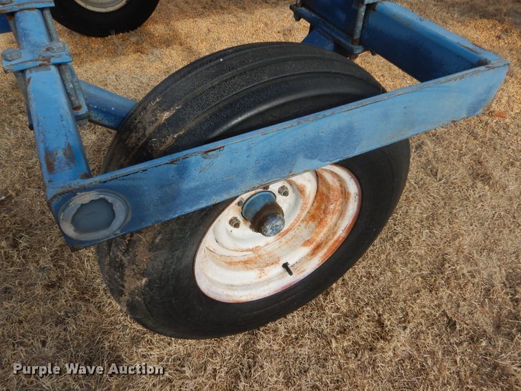 image for item GX9735 Red Ewald fertilizer trailer