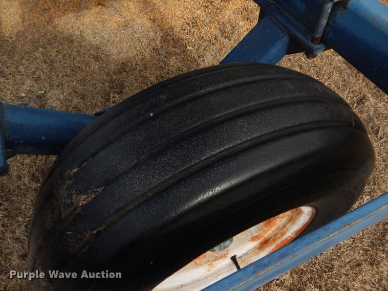 image for item GX9735 Red Ewald fertilizer trailer