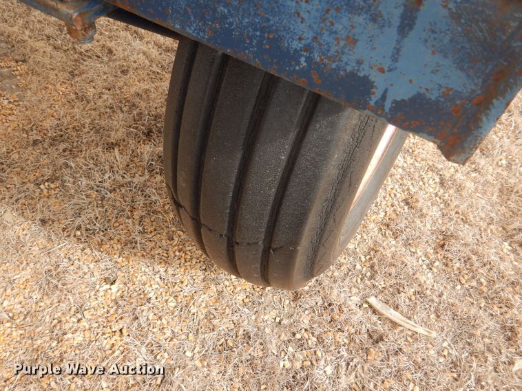 image for item GX9735 Red Ewald fertilizer trailer