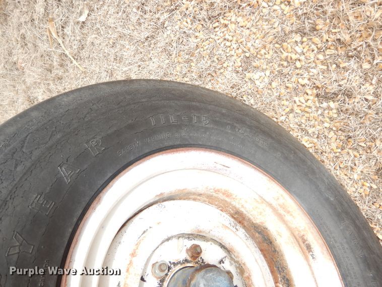 image for item GX9735 Red Ewald fertilizer trailer