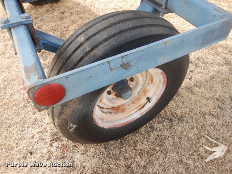 image for item GX9735 Red Ewald fertilizer trailer