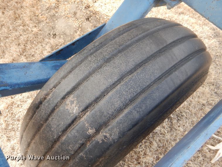 image for item GX9735 Red Ewald fertilizer trailer