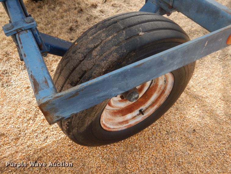 image for item GX9735 Red Ewald fertilizer trailer