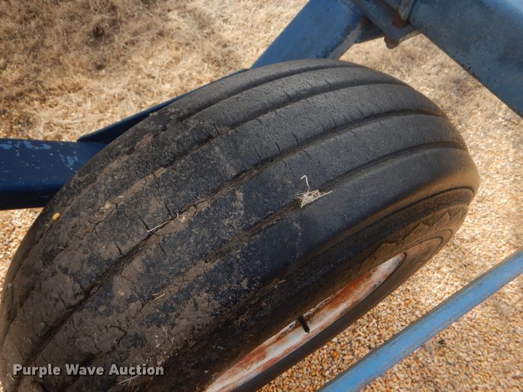 image for item GX9735 Red Ewald fertilizer trailer