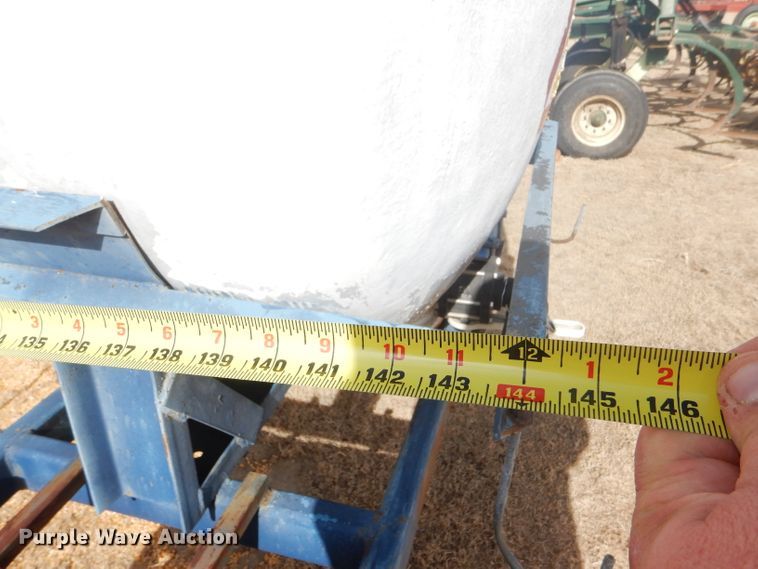 image for item GX9735 Red Ewald fertilizer trailer