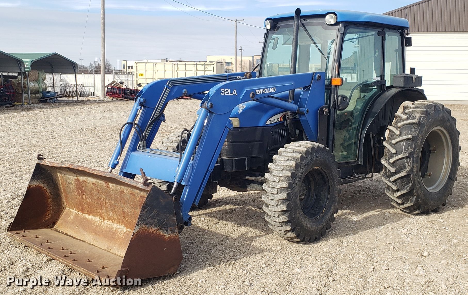 2003 New Holland TN55D MFWD tractor in Harrisonville, MO Item EZ9099