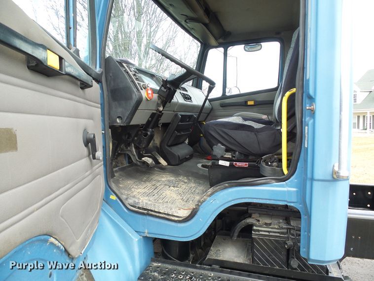 image for item DD1795 2003 Freightliner FL70 truck cab and chassis