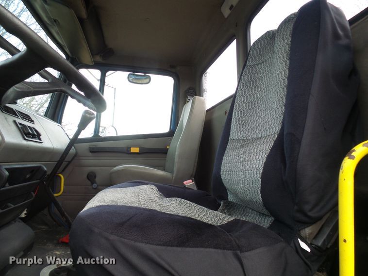 image for item DD1795 2003 Freightliner FL70 truck cab and chassis