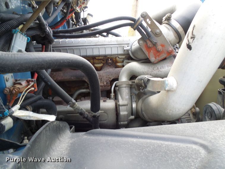 image for item DD1795 2003 Freightliner FL70 truck cab and chassis