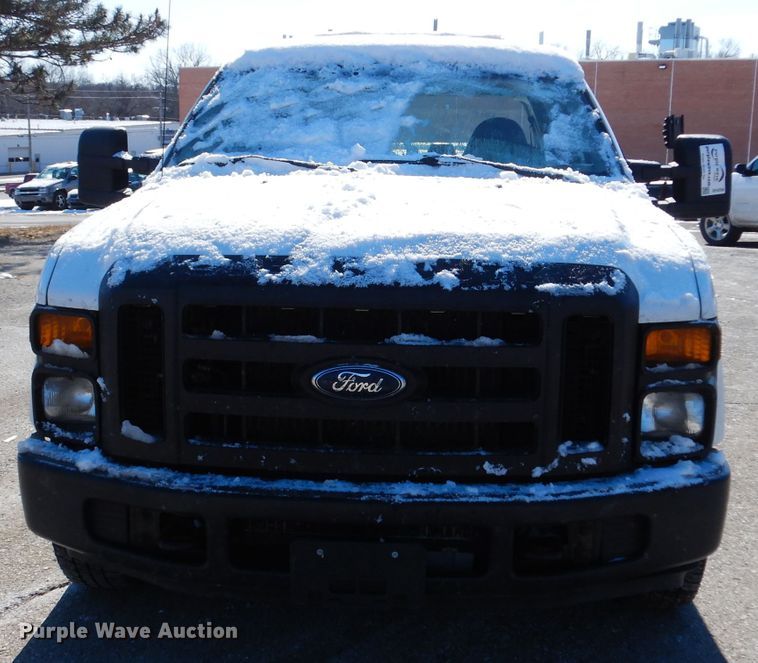 image for item DE4256 2009 Ford F250 Super Duty Crew Cab utility bed pickup truck