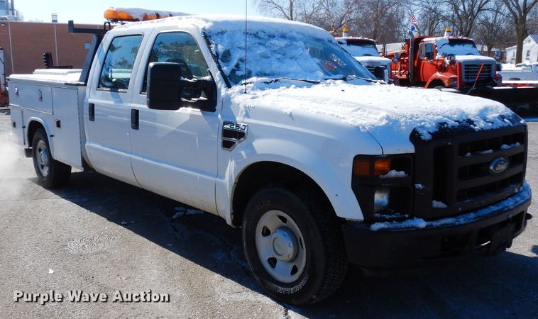 image for item DE4256 2009 Ford F250 Super Duty Crew Cab utility bed pickup truck