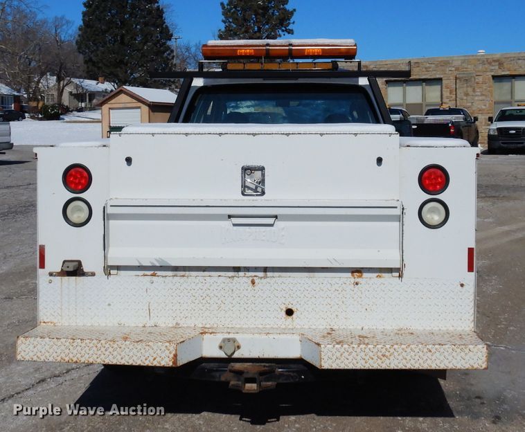 image for item DE4256 2009 Ford F250 Super Duty Crew Cab utility bed pickup truck