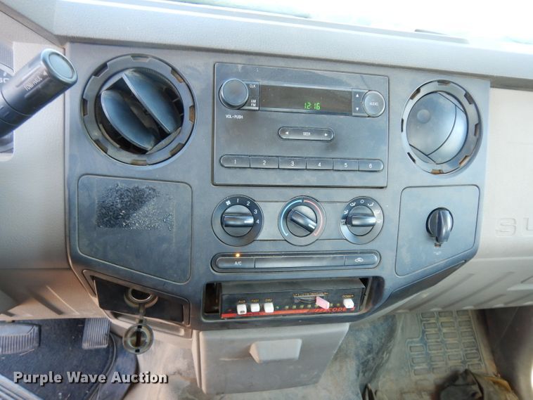 image for item DE4256 2009 Ford F250 Super Duty Crew Cab utility bed pickup truck