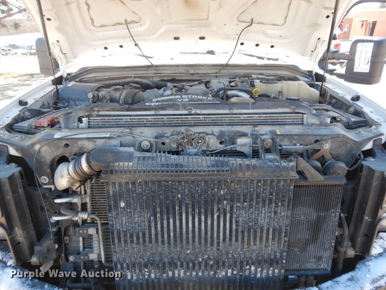 image for item DE4256 2009 Ford F250 Super Duty Crew Cab utility bed pickup truck