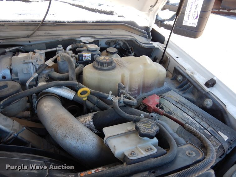 image for item DE4256 2009 Ford F250 Super Duty Crew Cab utility bed pickup truck