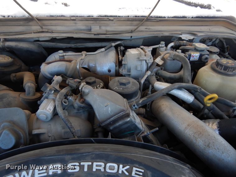 image for item DE4256 2009 Ford F250 Super Duty Crew Cab utility bed pickup truck