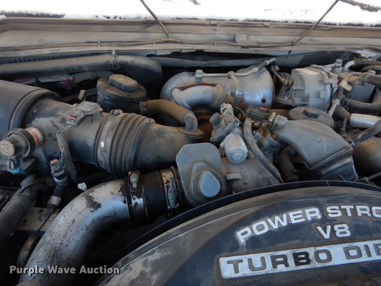 image for item DE4256 2009 Ford F250 Super Duty Crew Cab utility bed pickup truck