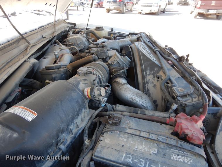 image for item DE4256 2009 Ford F250 Super Duty Crew Cab utility bed pickup truck