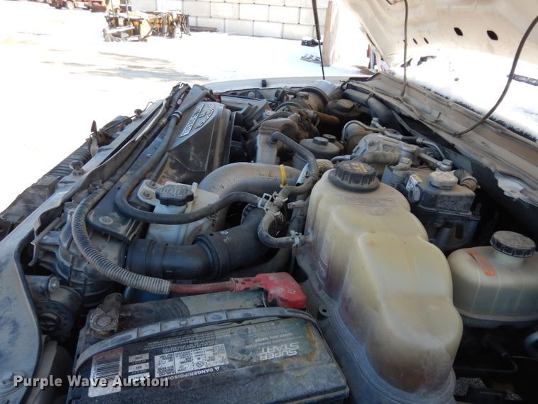 image for item DE4256 2009 Ford F250 Super Duty Crew Cab utility bed pickup truck