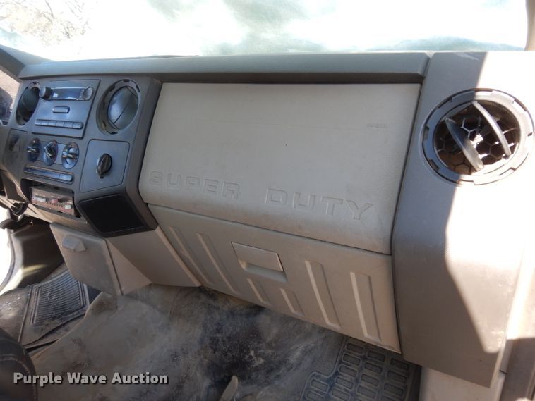 image for item DE4256 2009 Ford F250 Super Duty Crew Cab utility bed pickup truck