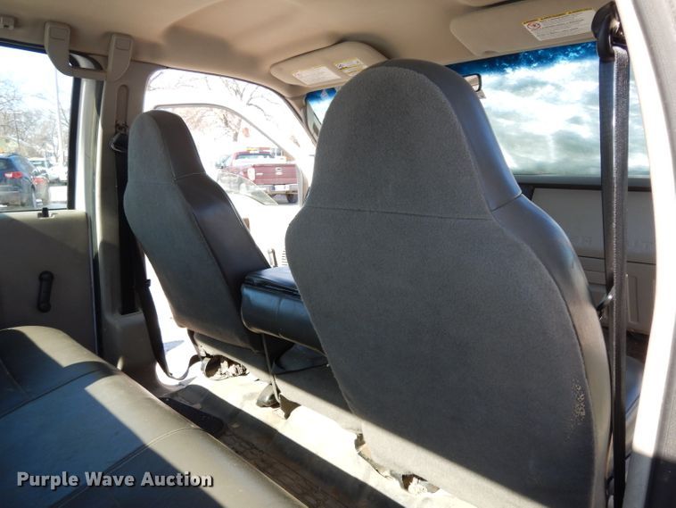 image for item DE4256 2009 Ford F250 Super Duty Crew Cab utility bed pickup truck