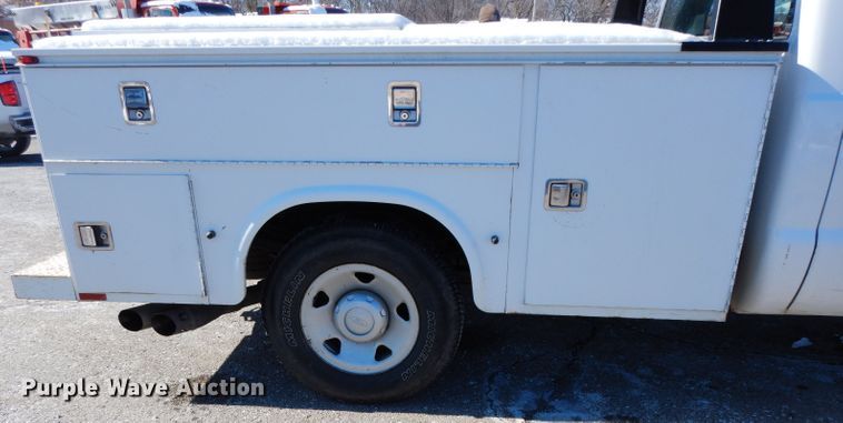 image for item DE4256 2009 Ford F250 Super Duty Crew Cab utility bed pickup truck