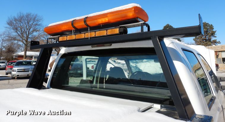 image for item DE4256 2009 Ford F250 Super Duty Crew Cab utility bed pickup truck