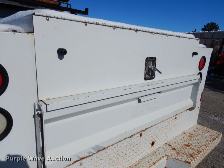 image for item DE4256 2009 Ford F250 Super Duty Crew Cab utility bed pickup truck