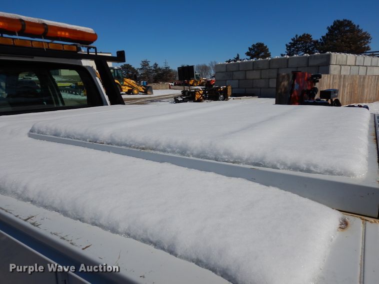 image for item DE4256 2009 Ford F250 Super Duty Crew Cab utility bed pickup truck