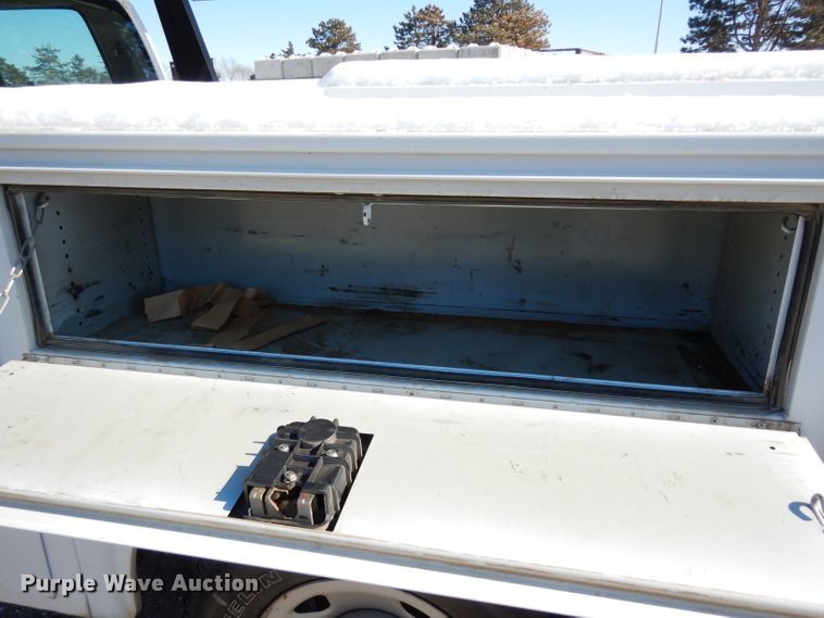 image for item DE4256 2009 Ford F250 Super Duty Crew Cab utility bed pickup truck