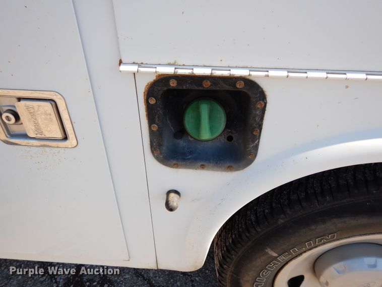 image for item DE4256 2009 Ford F250 Super Duty Crew Cab utility bed pickup truck