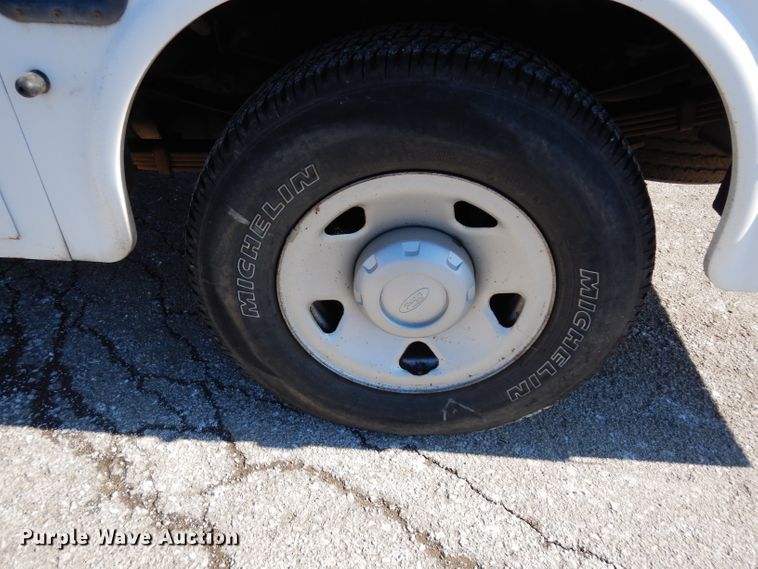 image for item DE4256 2009 Ford F250 Super Duty Crew Cab utility bed pickup truck