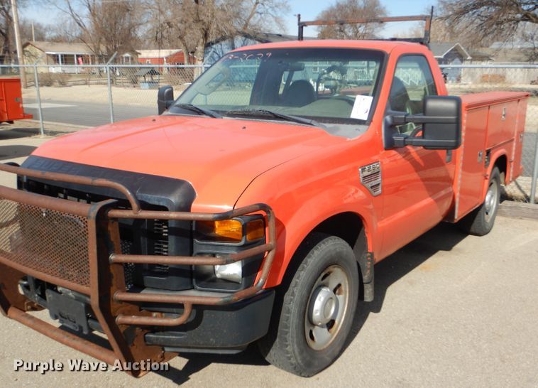 image for item DE4415 2009 Ford F250 Super Duty utility bed pickup truck