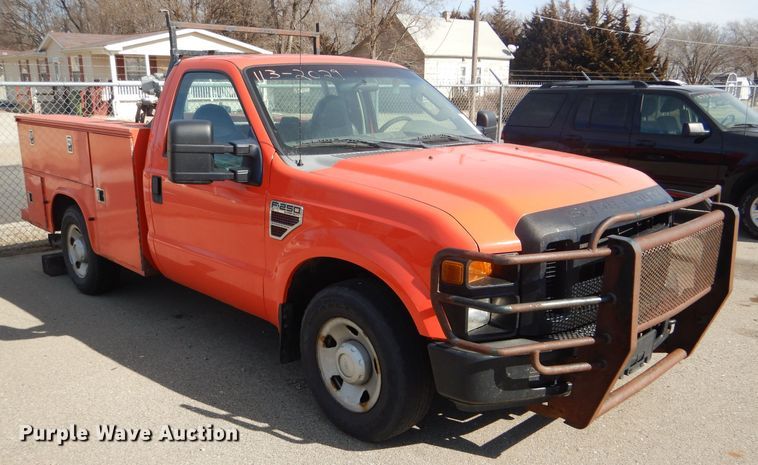 image for item DE4415 2009 Ford F250 Super Duty utility bed pickup truck