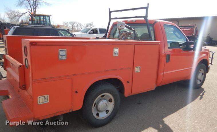 image for item DE4415 2009 Ford F250 Super Duty utility bed pickup truck