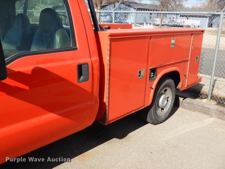 image for item DE4415 2009 Ford F250 Super Duty utility bed pickup truck