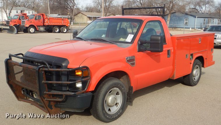 image for item DE4416 2009 Ford F250 Super Duty utility bed pickup truck