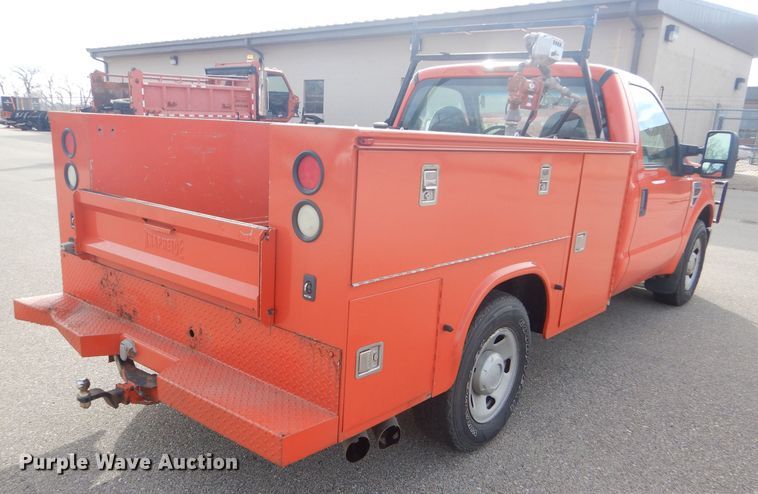 image for item DE4416 2009 Ford F250 Super Duty utility bed pickup truck