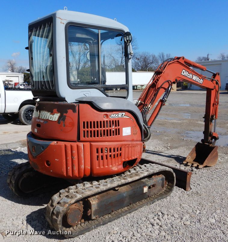 image for item GE9110 2003 Ditch Witch MX27 mini excavator