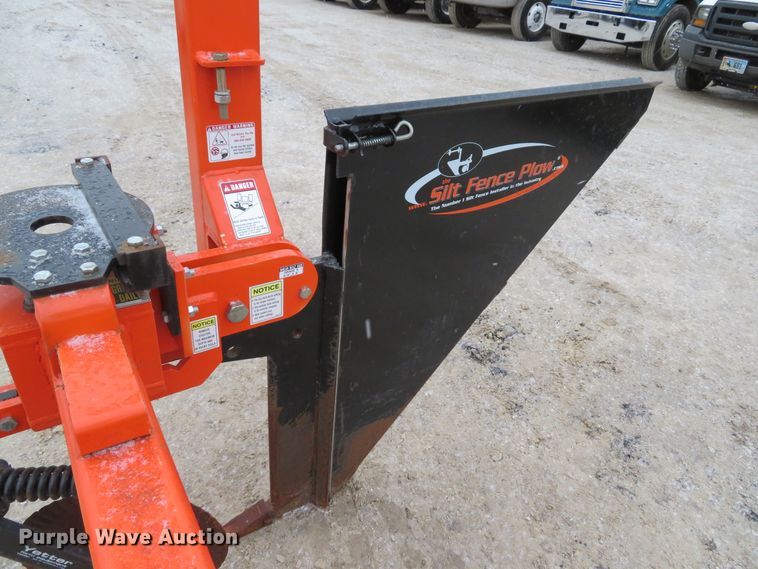 Skid steer silt fence plow in Troy, MO Item GI9065 sold Purple Wave